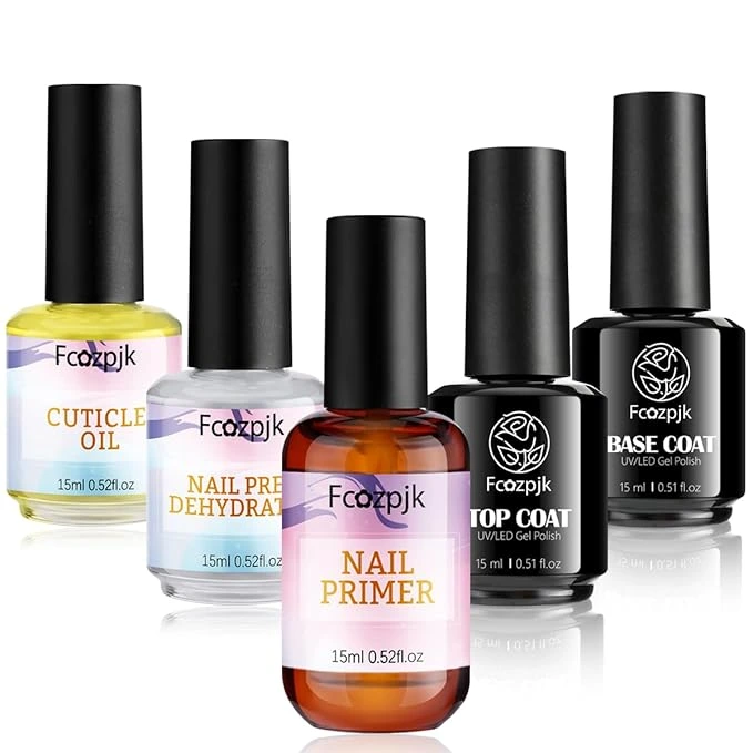 "Beginner applying acrylic nails on natural nails at home using nail prep tools on a clean desk"