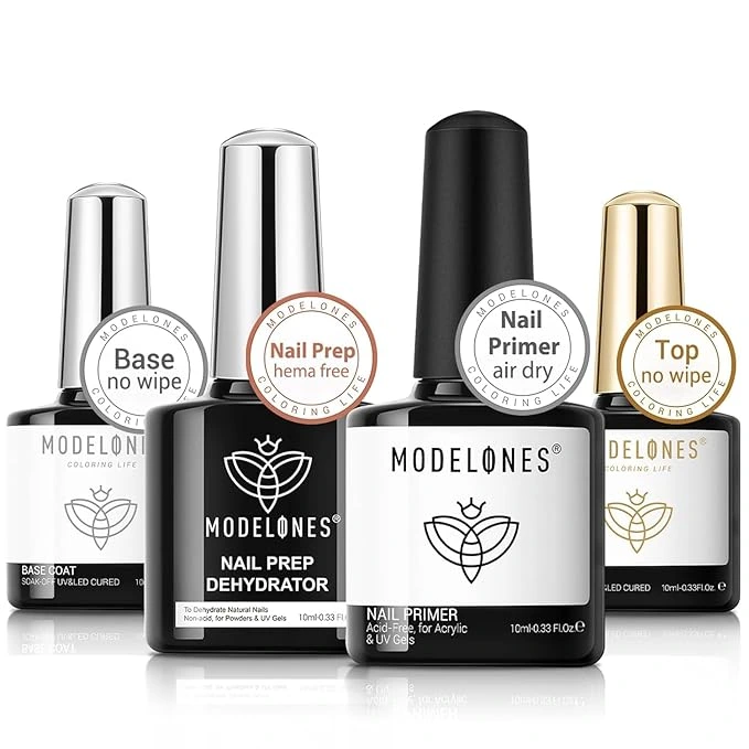 "Beginner applying acrylic nails on natural nails at home using nail prep tools on a clean desk"