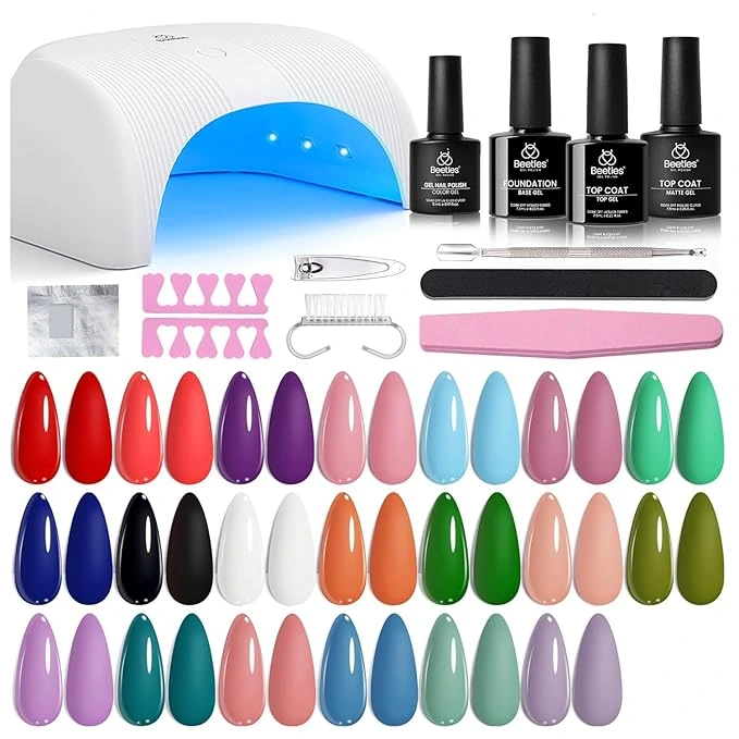 Beetles Gel Nail Kit featuring multiple colors and mini UV/LED lamp for easy home gel extensions