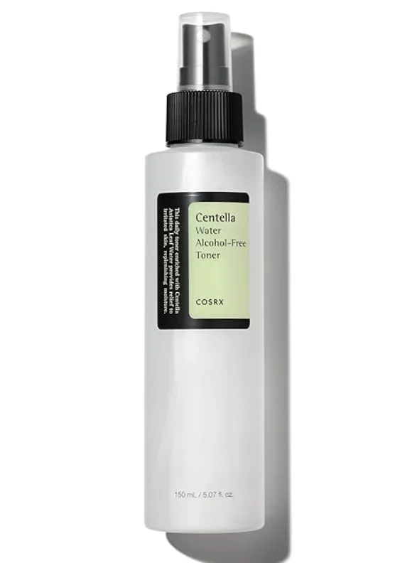 Applying hydrating toner or mist to prep skin for flooding routine